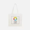 Share your brand on the go with a versatile custom tote bag. VistaPrint exclusive product 100% cotton canvas Open main compartment with easy access Double carry handles 13.4" height & width, 2.4" depth (exterior front to back of the bag) Print your design on both sides of the bag Care Instructions: To keep your printed design looking bold, washing is not recommended. The classic cotton tote bag is a go-to favorite for event giveaways and promotional packs. Easy to design and lightweight, these personalized tote bags won’t weigh you down when traveling for a trade show, conference or industry event. So, next time you need a big-batch giveaway, provide something people will regularly use that creates a positive image of your business. To make this classic tote bag your own, upload your logo to preview how it looks in our interactive design studio. From there, it’s easy to add additional text and edit the color and style. And if you need any help or a second opinion along the way, our design experts are on hand to support you.